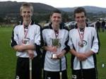North Captain Martin Bruce With The Fraser MacPhee Trophy Flanked By Skye Team Mates Scott MacLeod and Iain Grant
